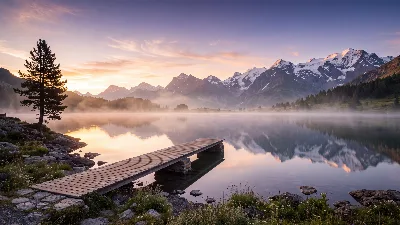 Sunrise Over Misty Alpine Lake