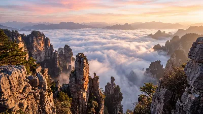 Sunrise Over Cloud-Crowned Karst Plateau